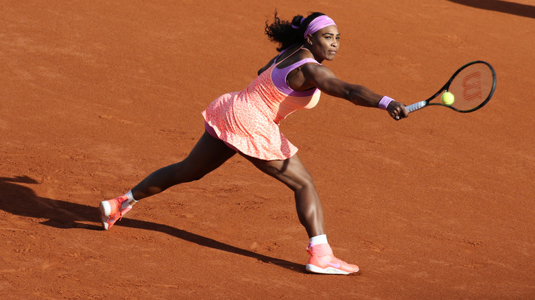 Serena reaches for ball