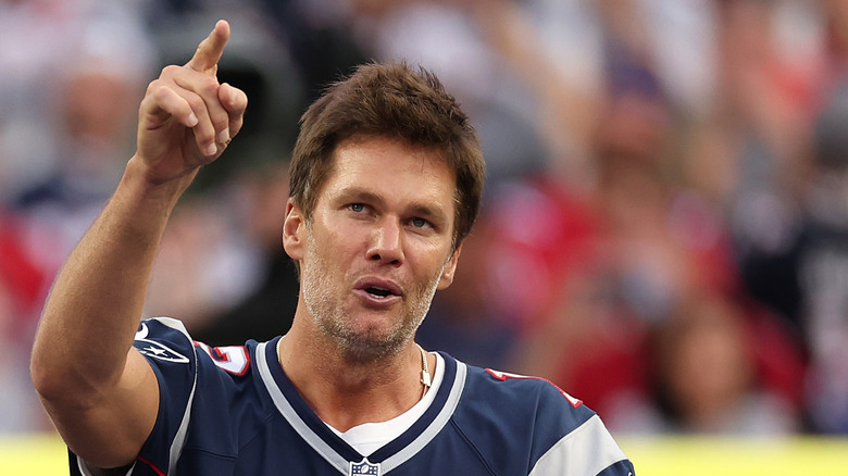 Tom Brady finger pointed air