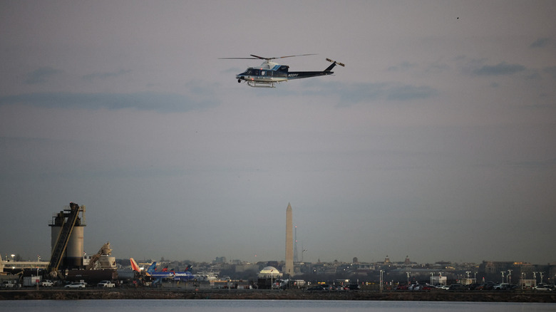 Emergency helicopter flying above crash