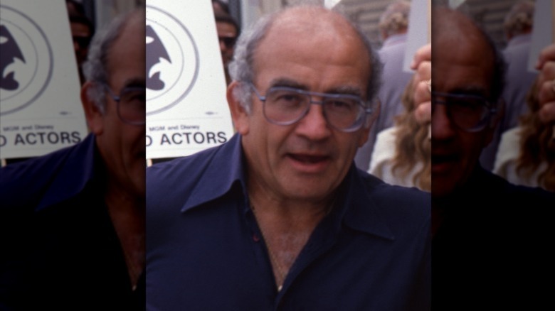 Ed Asner picketting