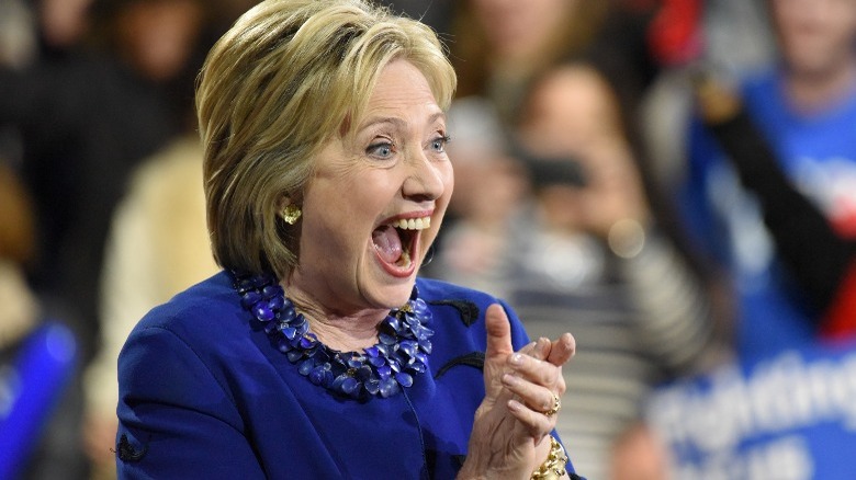 Hillary Clinton clapping and smiling