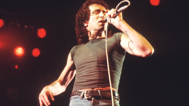 AC/DC's Bon Scott singing on stage in 1976