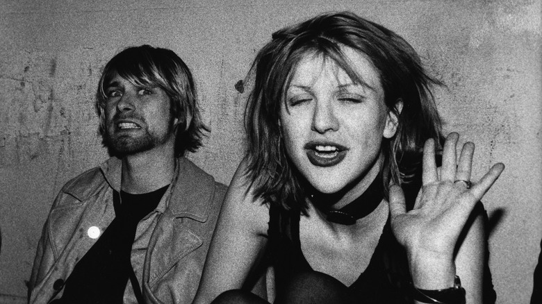 Kurt Cobain and Courtney Love making faces