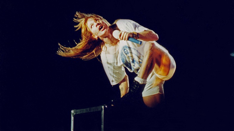 Axl Rose acrobatic hair swinging singing