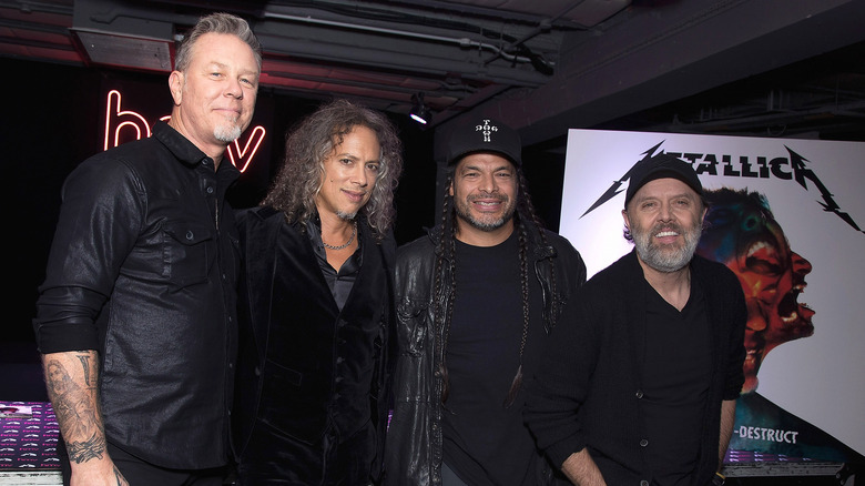 Metallica posing together for a photo
