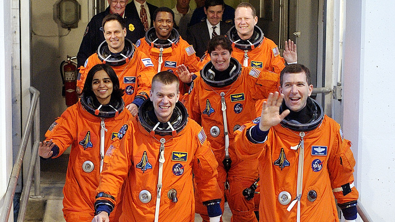 Columbia crew walking in spacesuits