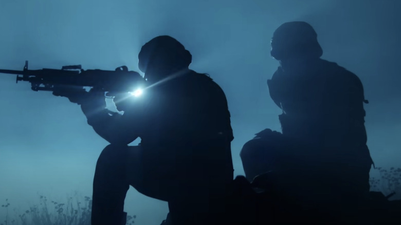 Navy SEALs in silhouette 