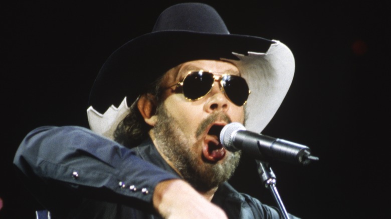 Hank Williams Jr. sunglasses on stage