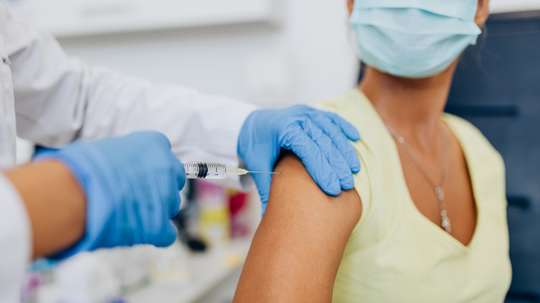 Woman getting vaccine