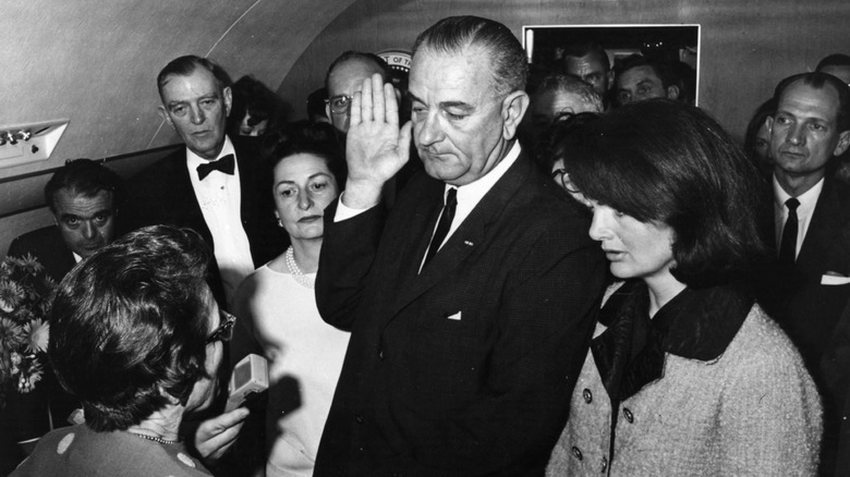 Lyndon B. Johnson being sworn in