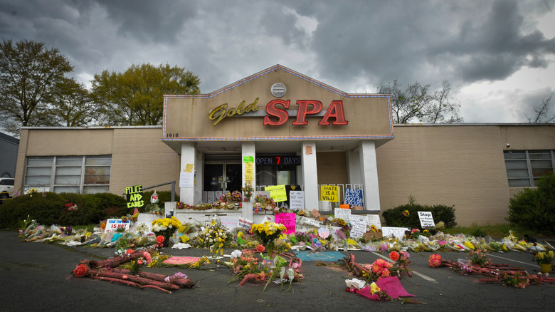 gold spa location of atlanta shooting with flowers 