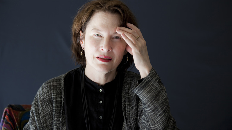 alice sebold with hand on forehead 