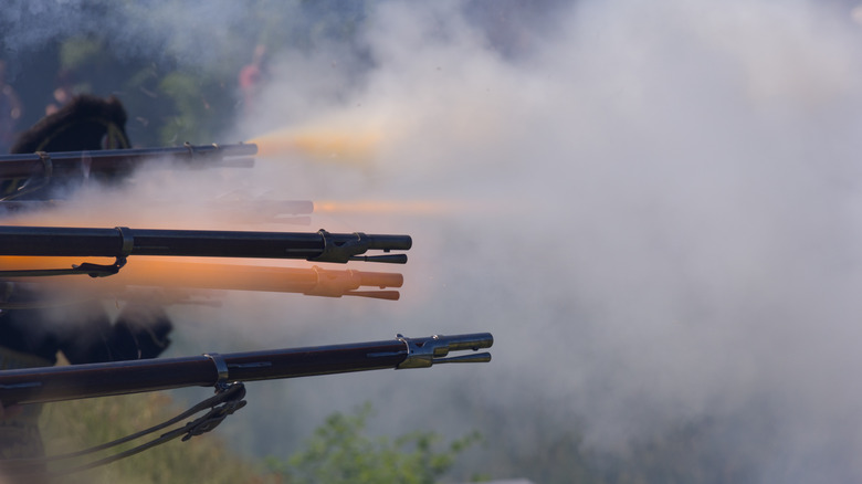 flintlock muskets shooting