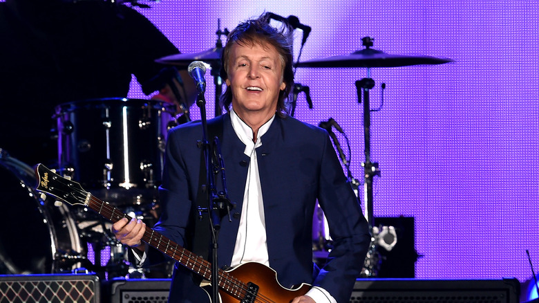 Paul McCartney playing guitar