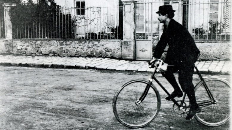 Alfred Jarry on bicycle