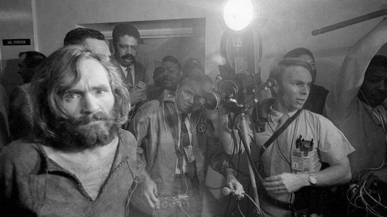 Charles Manson with press and security