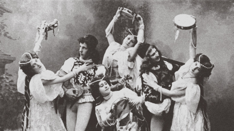 ballerinas pose with tambourines swan lake  1895