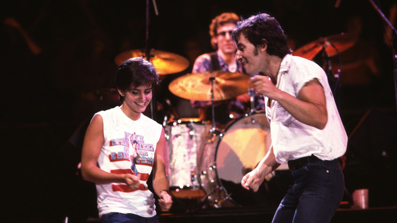 Bruce Springsteen dancing with Courtney Cox for the "Dancing in the Dark" video