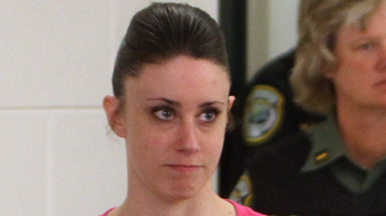 Casey Anthony with police officers