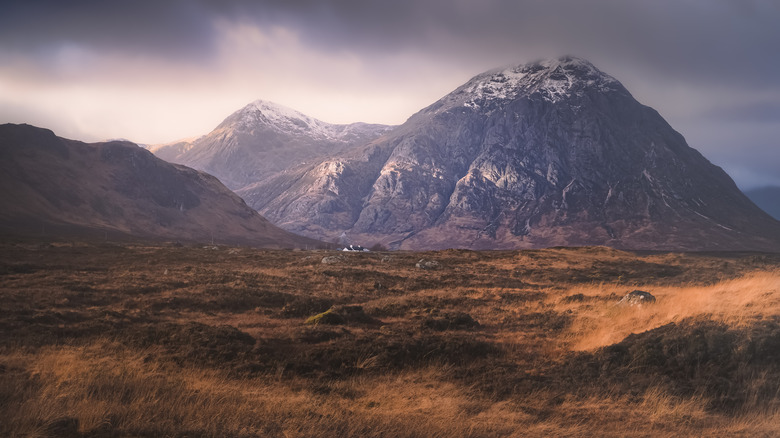 Mountain and cottage in Scottish Highlands