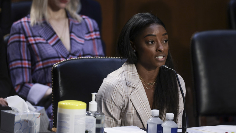 Simone Biles testifying in Congress