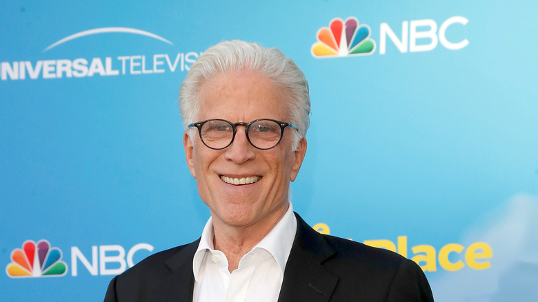 Ted Danson in smiling in glasses