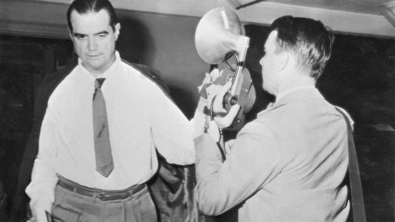 Howard Hughes having his photo taken