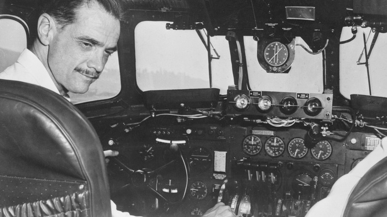 Howard Hughes in an airplane cockpit