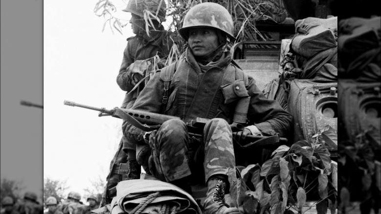 ARVN soldier on tank