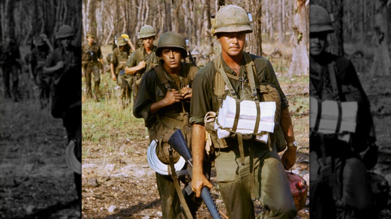 US soldiers standing in Ia Drang Valley