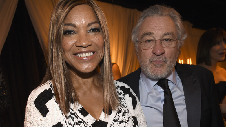 Robert De Niro suit glasses Grace Hightower backstage