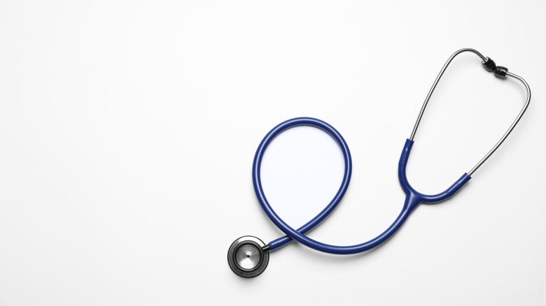 blue stethoscope white background