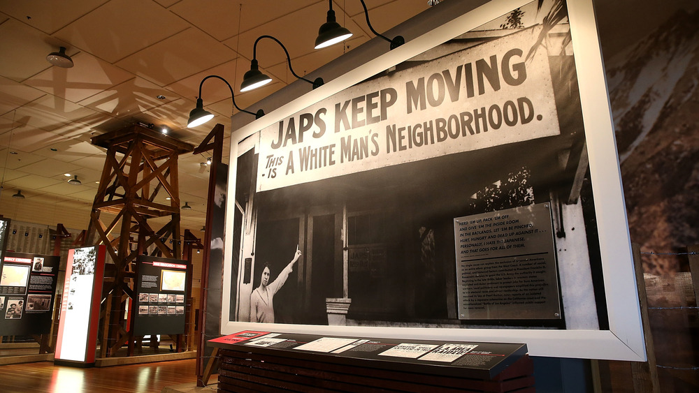 WWII era photo saying "Japs keep moving. This is a white man's neighborhood."