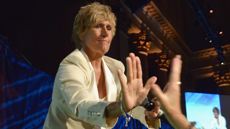 Diana Nyad onstage giving high five