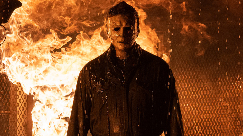 Michael Myers emerges from the burning cabin