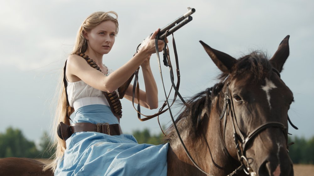 Cowgirl on horseback