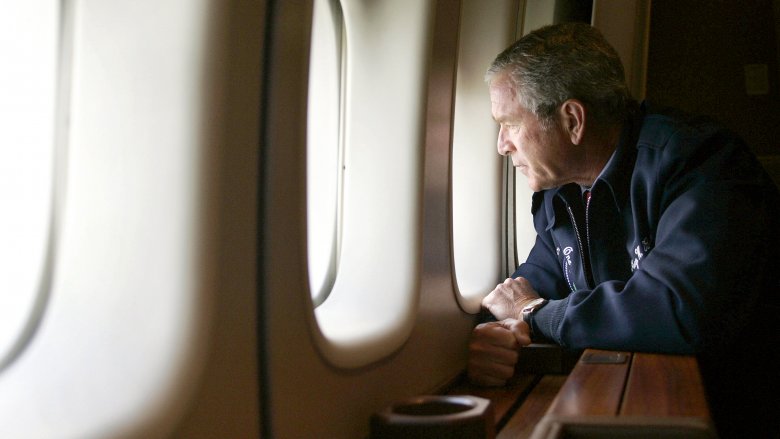 George W. Bush looks out the window of Air Force One