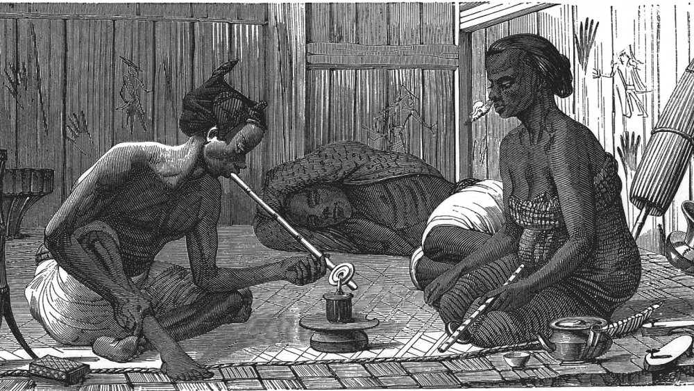 Period engraving of opium smokers