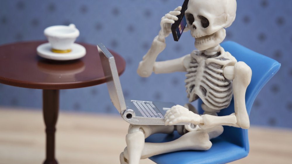 skeleton on the phone