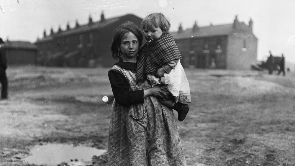 A miner's daughter and infant sibling dirty