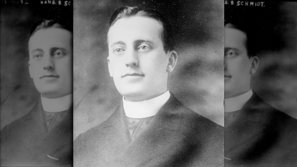 Father Hans Schmidt wearing priest collar