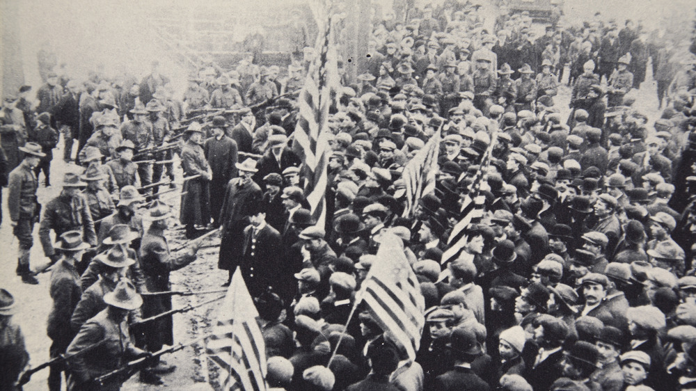 Armed troops confronting protesters