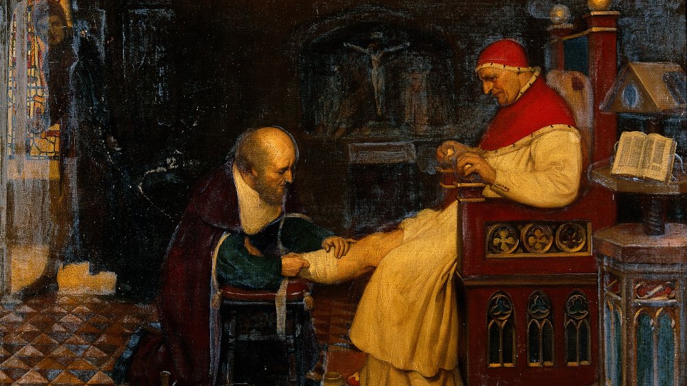 Guy de Chauliac bandaging the leg of Pope Clement VII at Avignon, while Petrarch, his enemy, jealous of his influence, watches him, ca. 1348. Oil painting by Ernest Board.