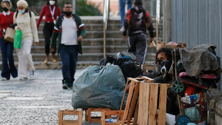 man living on street Latin America