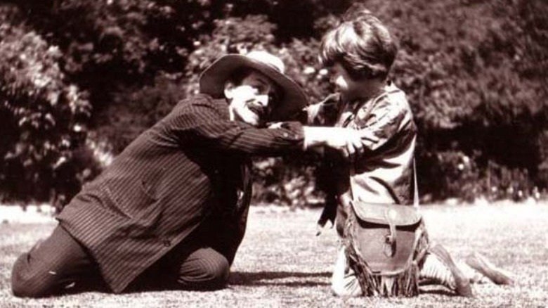 picture of J.M. Barrie playing with Michael Davies