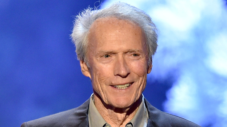 clint eastwood grimacing looking sideways