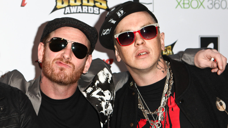 Corey Taylor and Sid Wilson posing