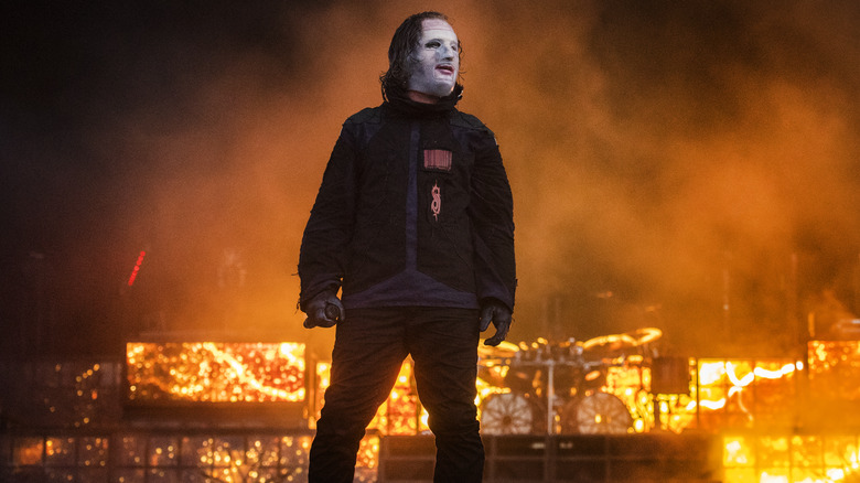 Corey Taylor standing on stage