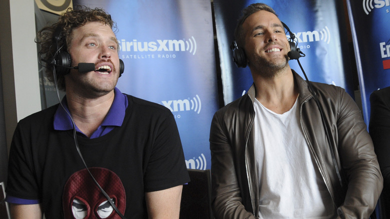 T.J. Miller and Ryan Reynolds headsets speaking SiriusXM