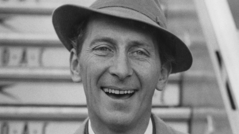 Peter Cushing smiles